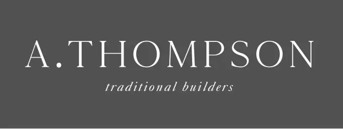 A Thompson Traditional Builders logo grey